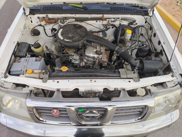 نيسان ده بل 2003 زيت ته بريد باوه ر  - 5