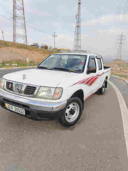 نيسان ده بل 2003 زيت ته بريد باوه ر  - 6