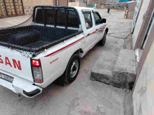 نيسان ده بل 2003 زيت ته بريد باوه ر  - 3