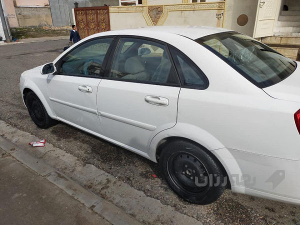 ئۆپترا مۆدیل ـ2010 رەنگی سپی ،،گیر عادی  - 3