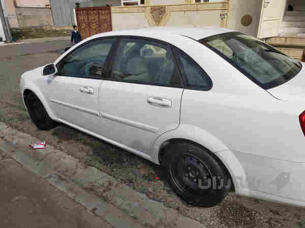 ئۆپترا مۆدیل ـ2010 رەنگی سپی ،،گیر عادی  - 3