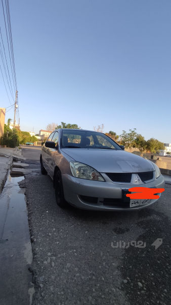 لانسر مەکینە بچوک 2007بێ عەیب  - 2
