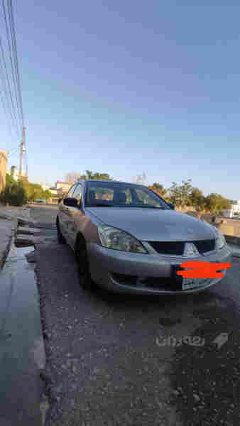 لانسر مەکینە بچوک 2007بێ عەیب  - 2
