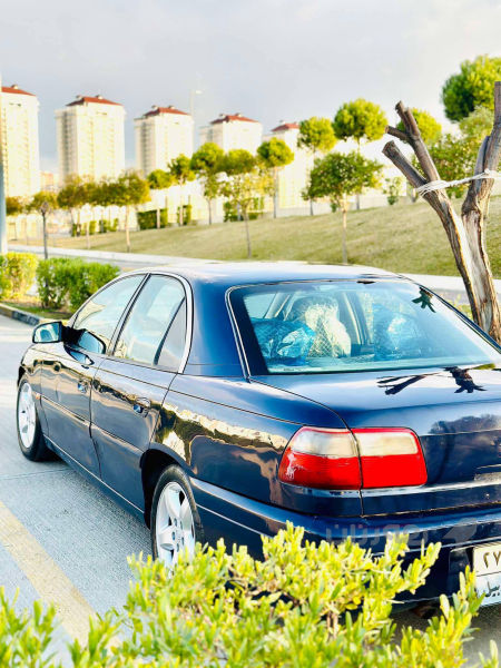 ئۆپل ئۆمێگا 2001 - 3