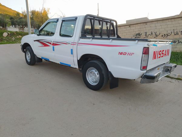 نیسان دەبڵ مۆدێل 2003  - 2