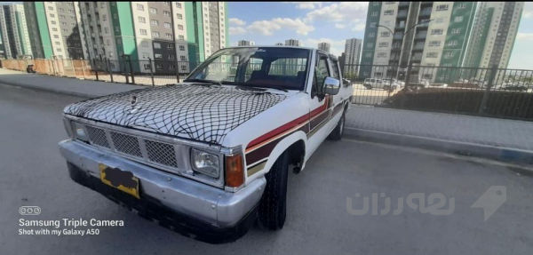 پیکاب نیسان دەبڵ ناو سور