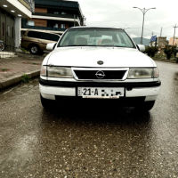 ئۆپڵ ڤیکترا 1990