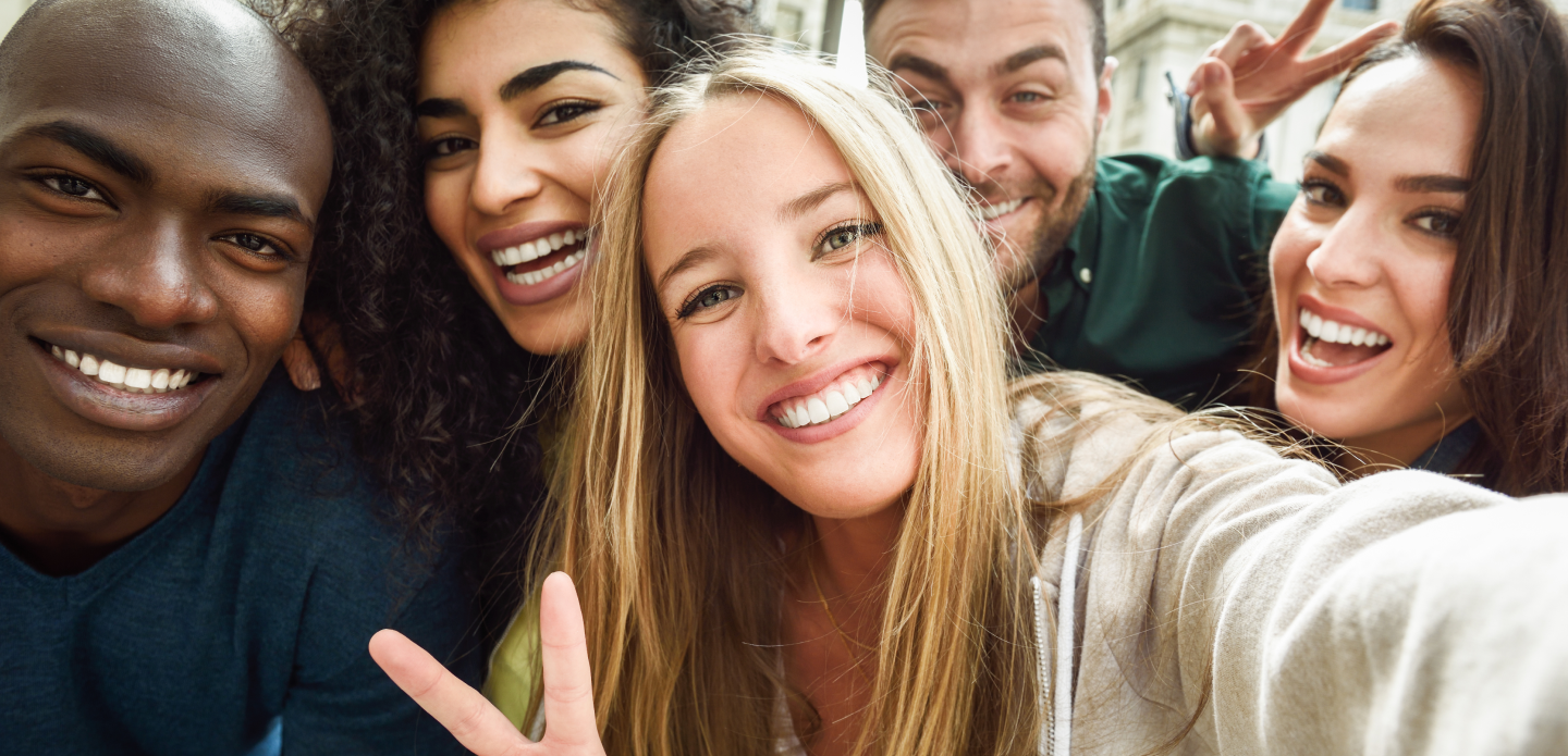 multiracial-group-young-people-taking-selfie