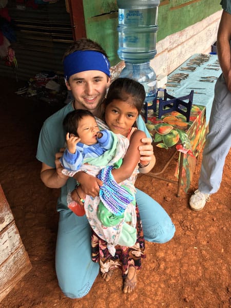 Doctor Lucas during humanitarian visit with patients from Chisec.