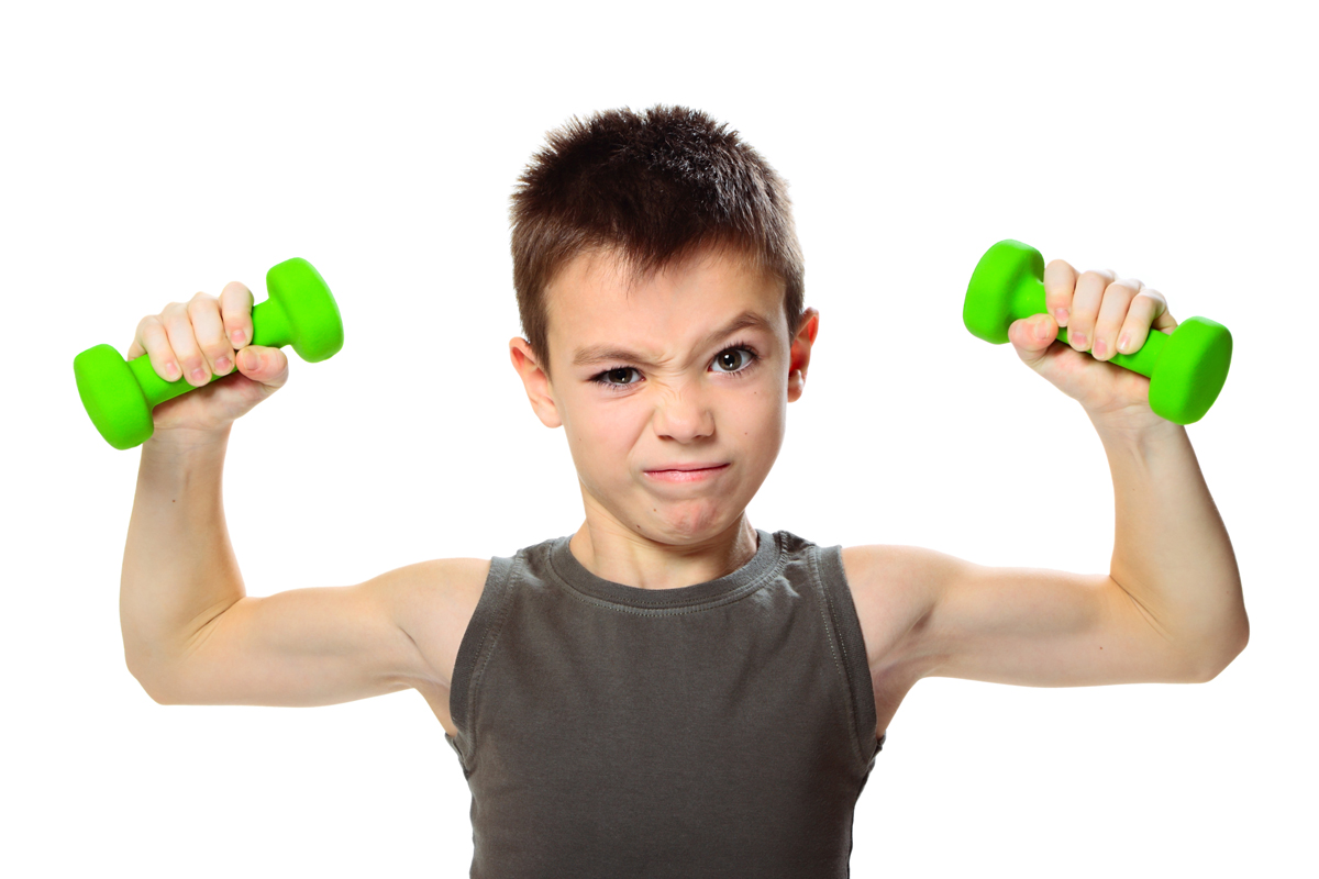 A child lifting small dumbbells.