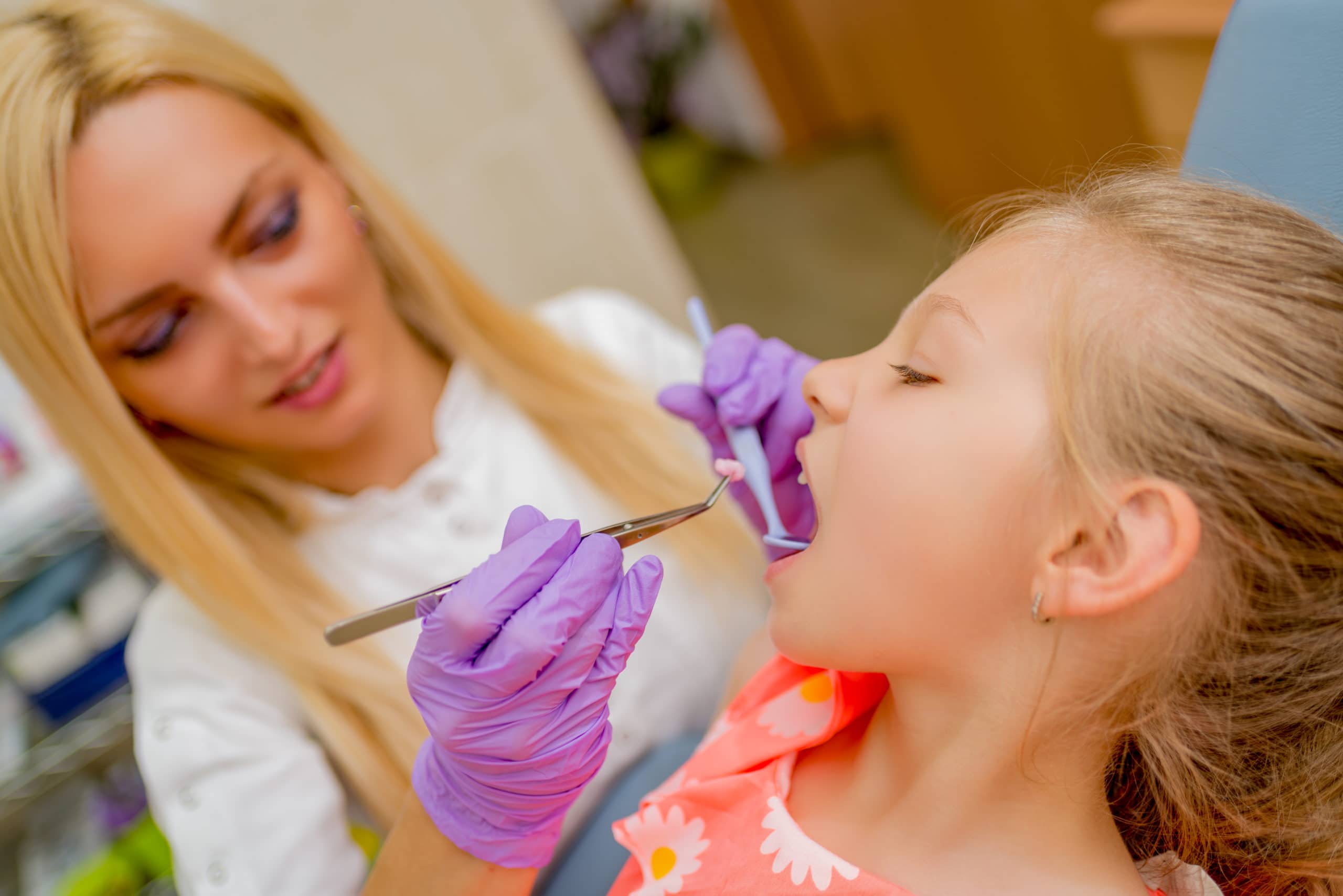 A young girl during her oral exam.