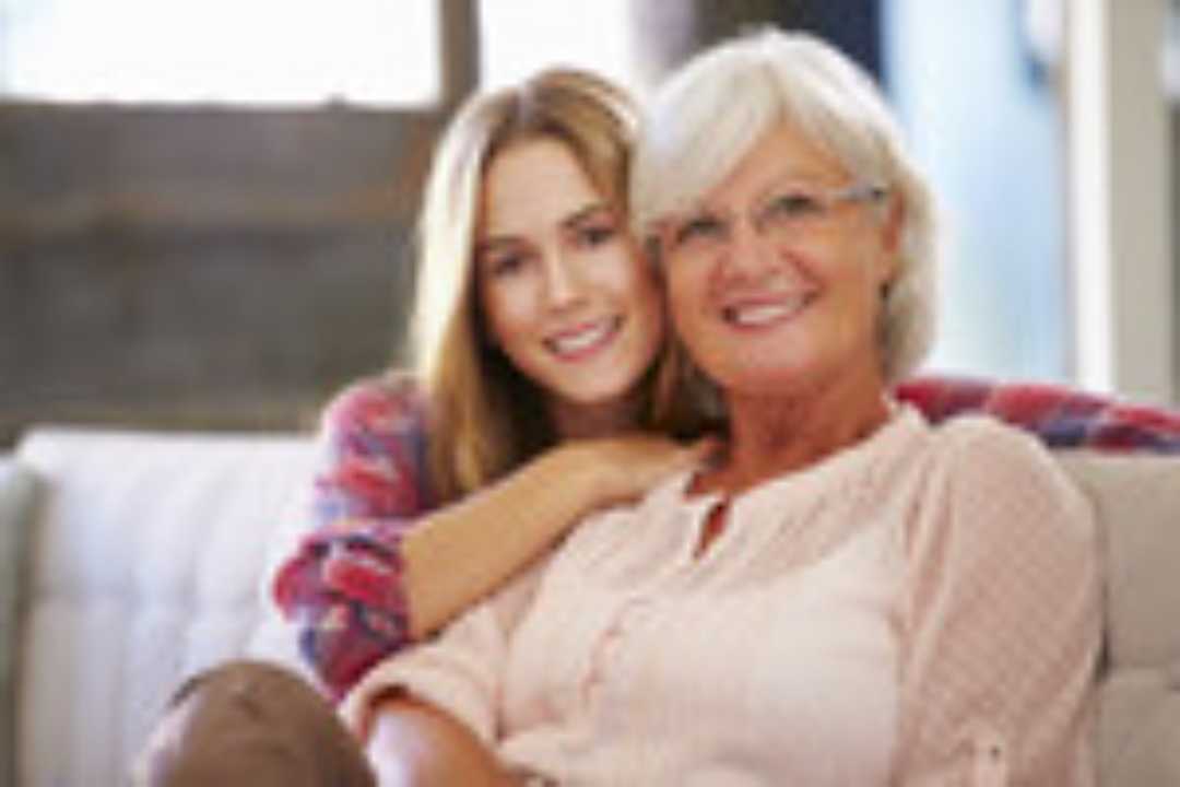 senior woman smiling with her daughter
