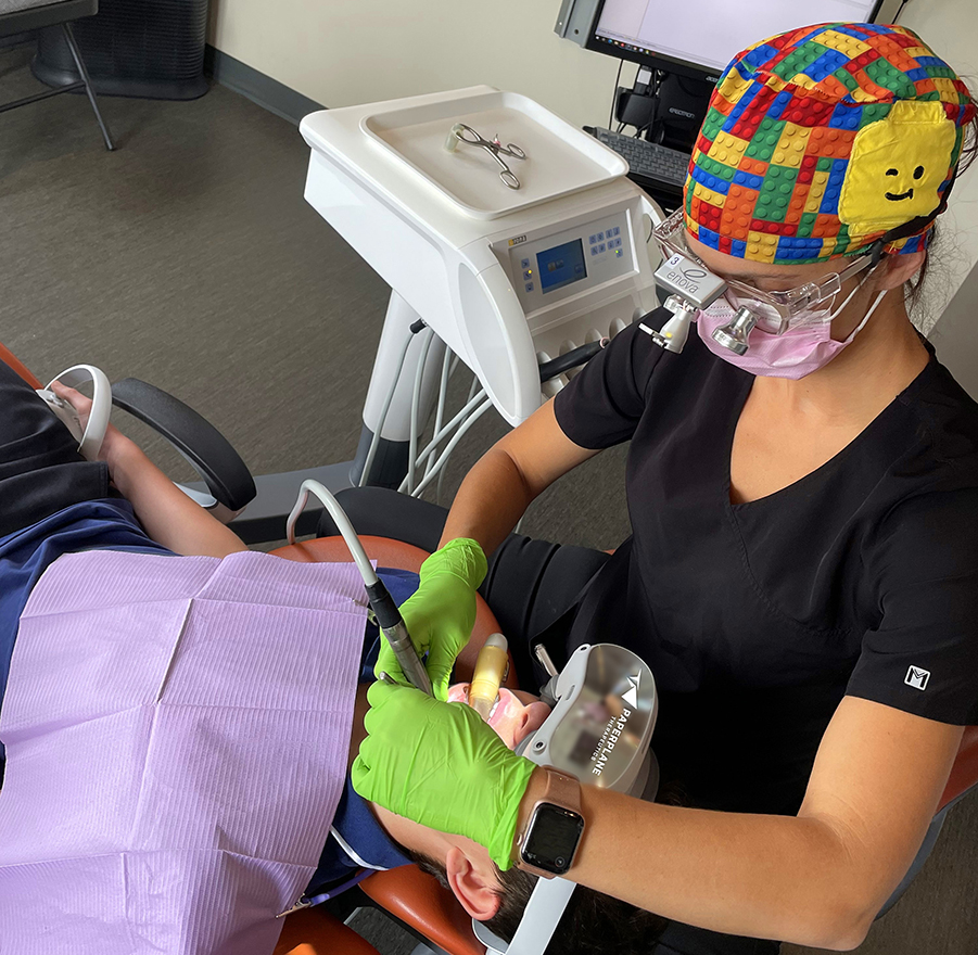 A dental patient wearing a VR headset.