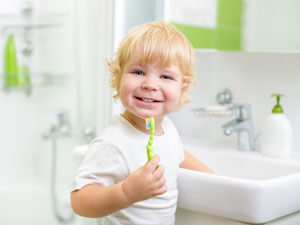 Child brushing teeth