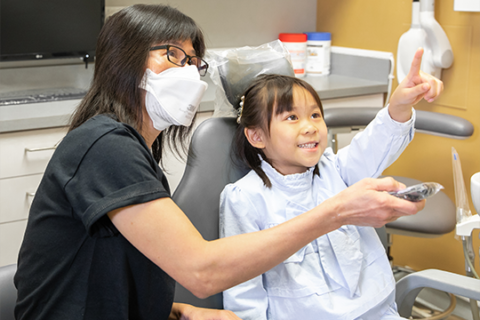 Dental Assistant Kieu with a child patient at Markham Dental.