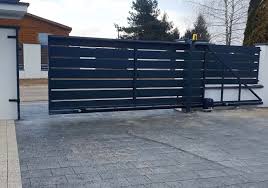 MOTORIZED CANTILEVER GATE