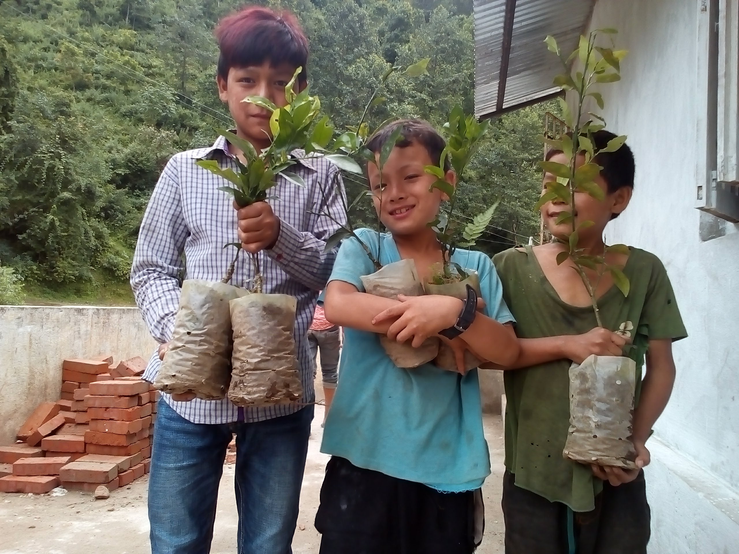 Kids with plants at Tistung