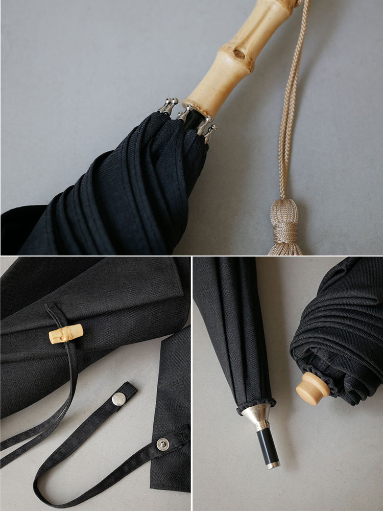 ビコーズのプレーンカラー長傘。レザー製ストラップとロープの結び目が特徴的な晴雨兼用の手開きタイプ傘。
