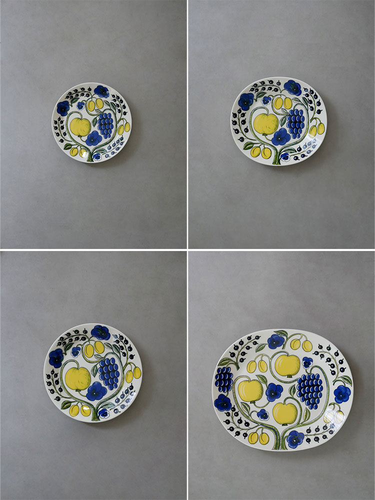 アラビアのパラティッシプレート、白地に青と黄色の模様が施された磁器製の食器