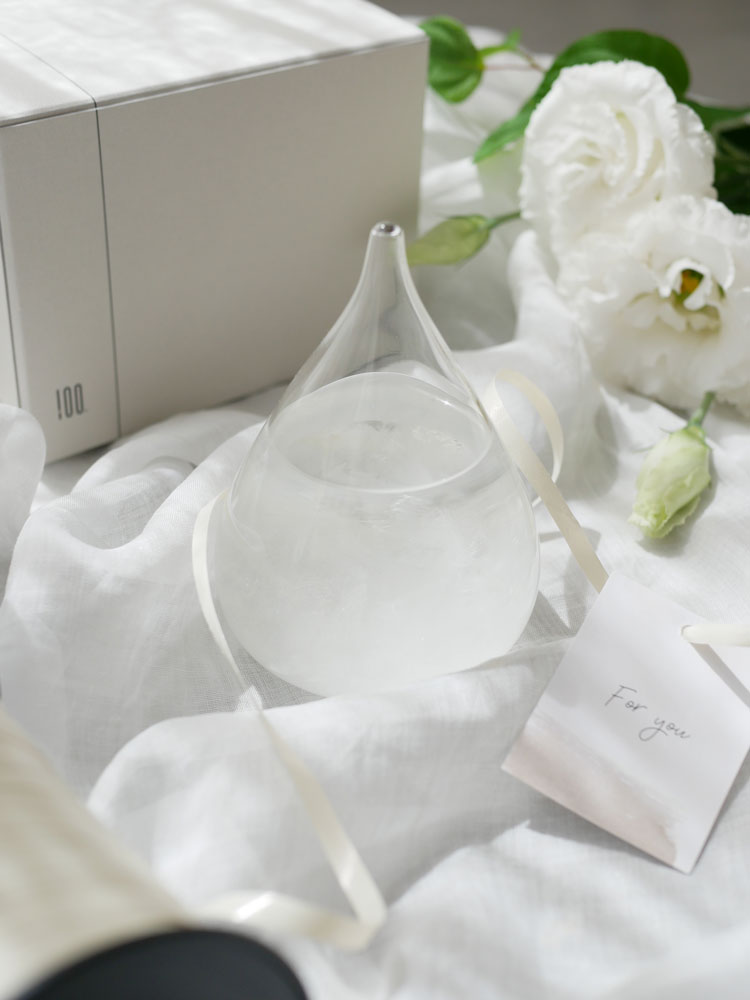 結晶の変化を楽しむ透明なガラス製Tempo Dropに液体が入った商品画像