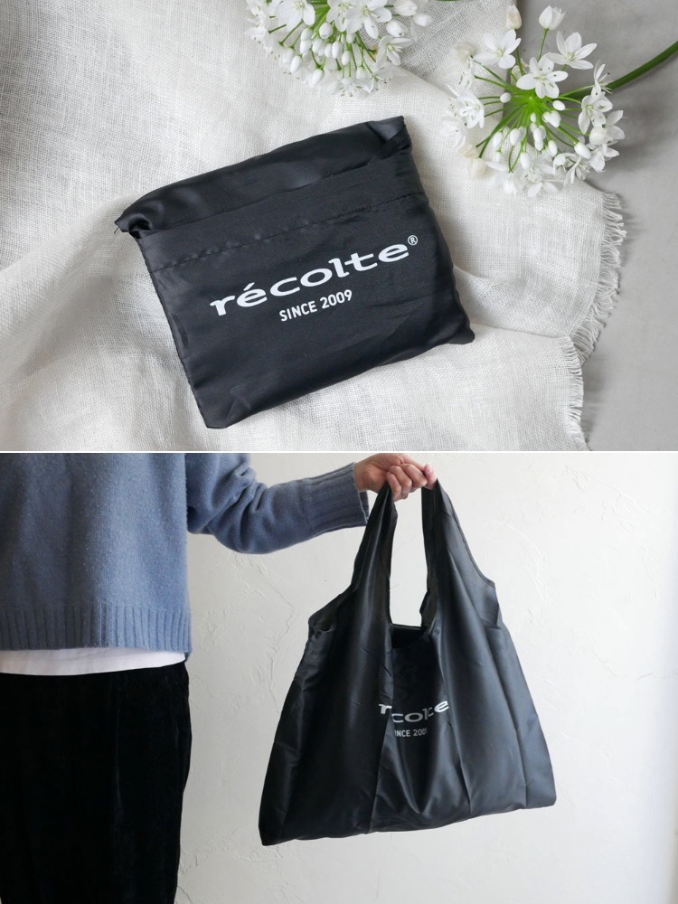 黒と灰色のレザーショルダーバッグ。ファッショナブルなデザインで、丈夫なストラップが特徴のハンドバッグです。