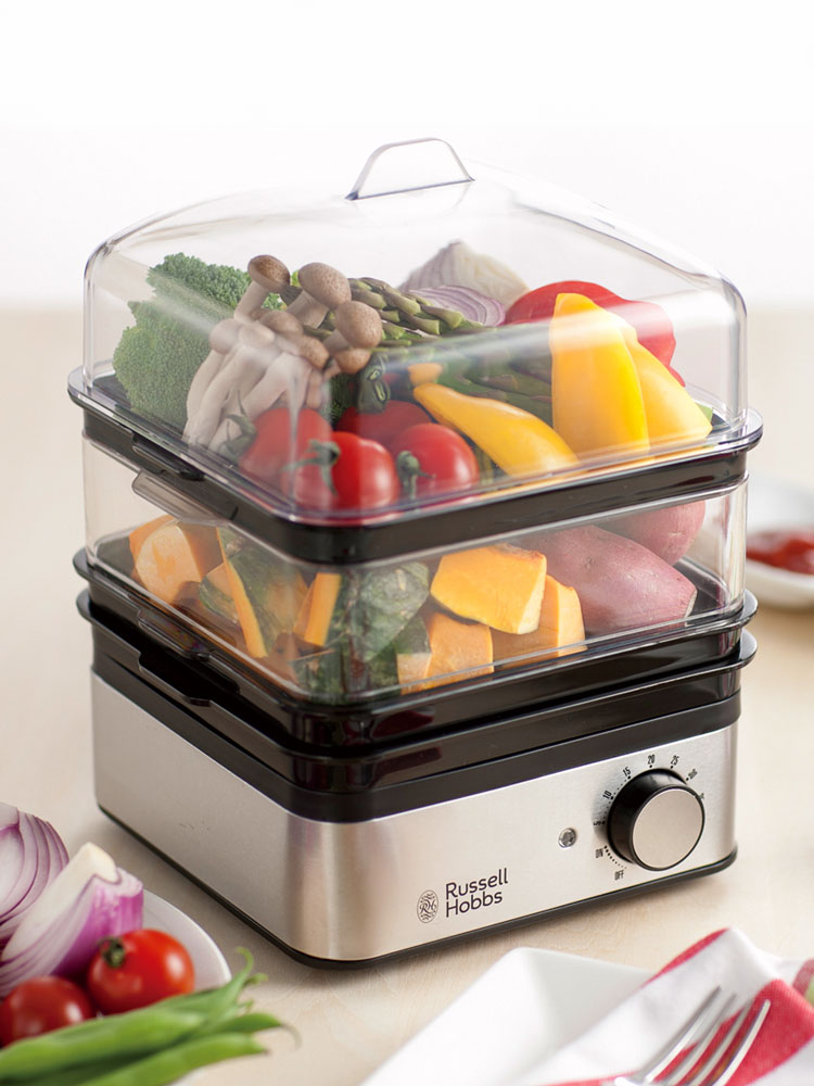ラッセルホブスのミニスチーマーに蓋がかかり、新鮮な野菜が蒸されているキッチン用品の画像