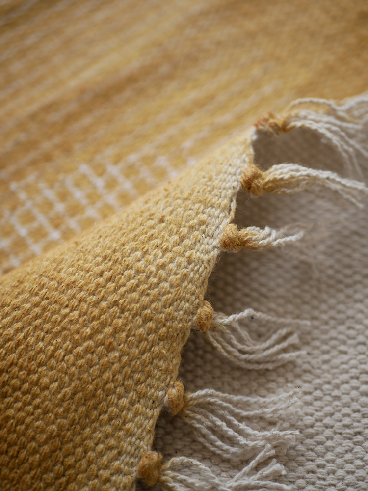 アデペシュ MANEREシリーズの黄色い100％コットン織物ラグ