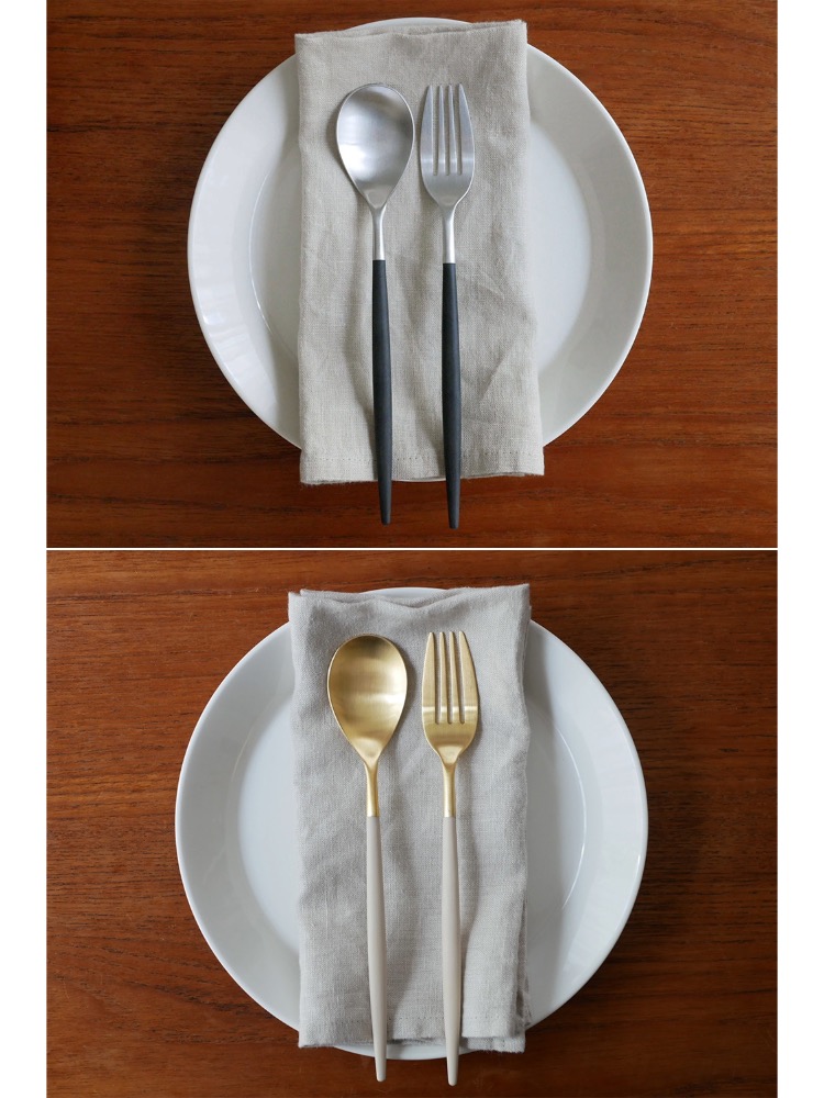 クチポールのMIOカトラリーセットで、フォーク、スプーン、ナイフが美しく並べられたテーブルセッティング