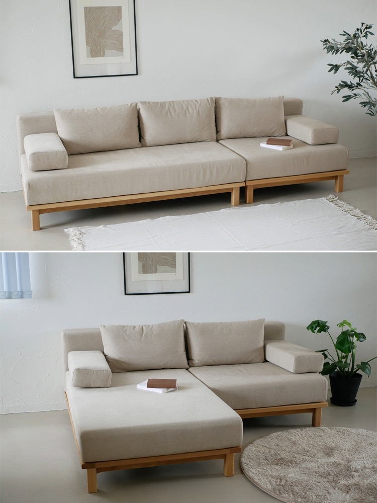 シーブのゆったり座れるレクトユニットソファーが木製フレームと快適なクッションでリビングルームに配置されています。