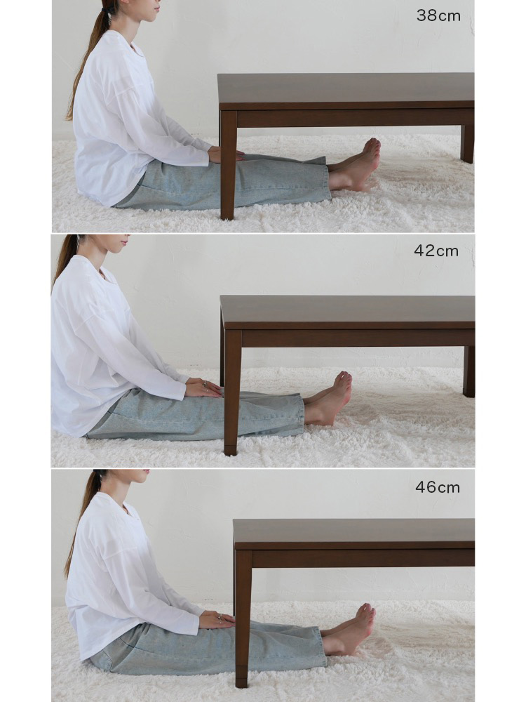 高さ調節可能なリビングこたつが、快適なソファと共にリビングルームに配置されている様子