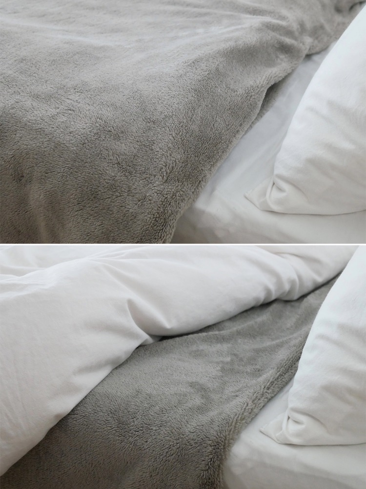 ルボアのグレー2WAY掛け布団カバーとベッドシーツが整えられたベッドルーム