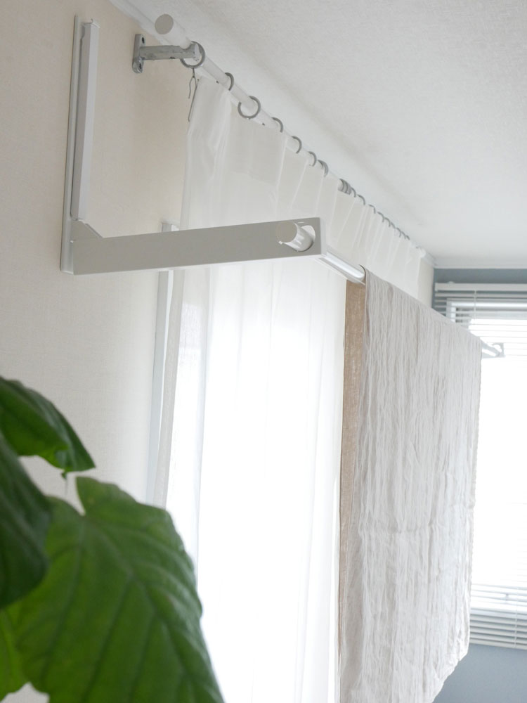 タワーウォール折り畳み物干し竿ホルダーの画像