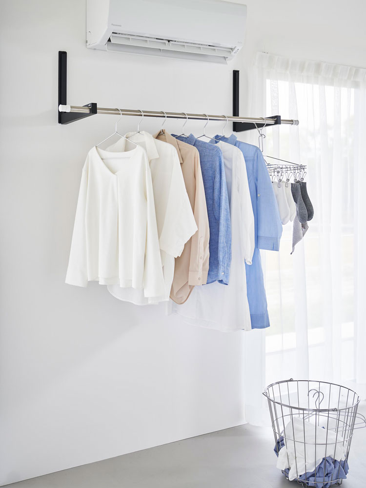 タワータイプのウォール折り畳み物干し竿ホルダー