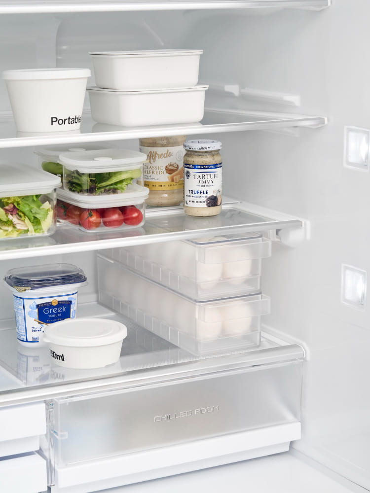 タワー冷蔵庫用中蓋付き卵ケース。ポリスチレン製で14個の卵を収納可能な設計