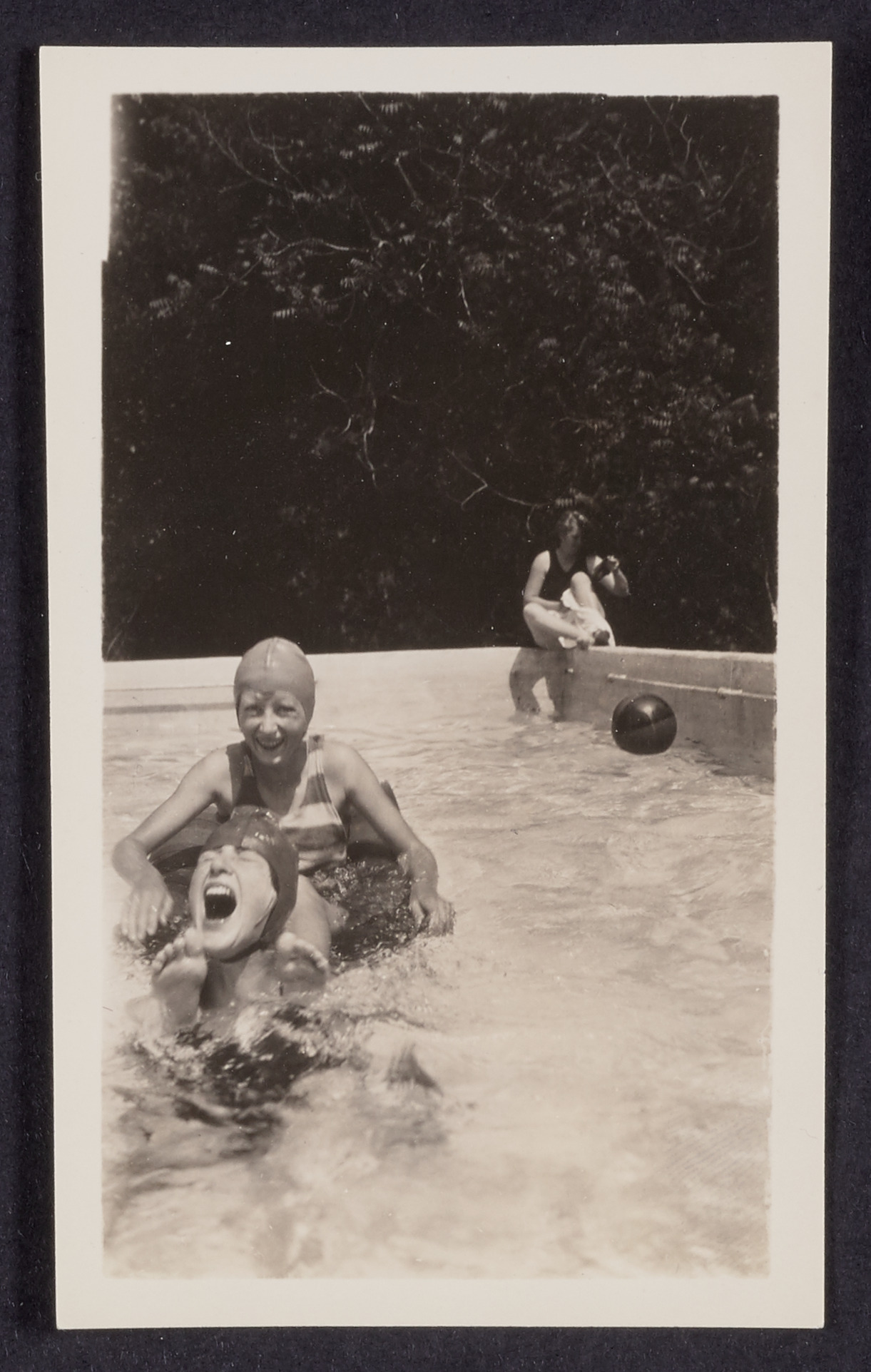 Sally and Marjorie Patterson playing in the family pool, 1920 (Internet Archive)