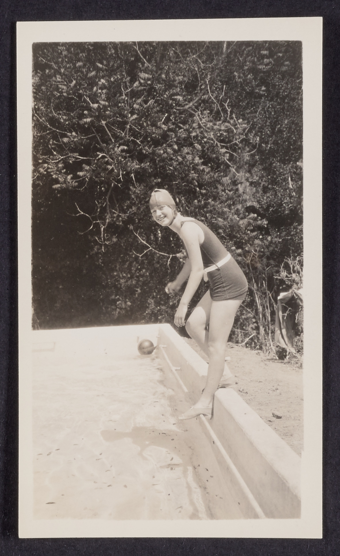 Sally Patterson about to get into the family pool, 1920 (Internet Archive)