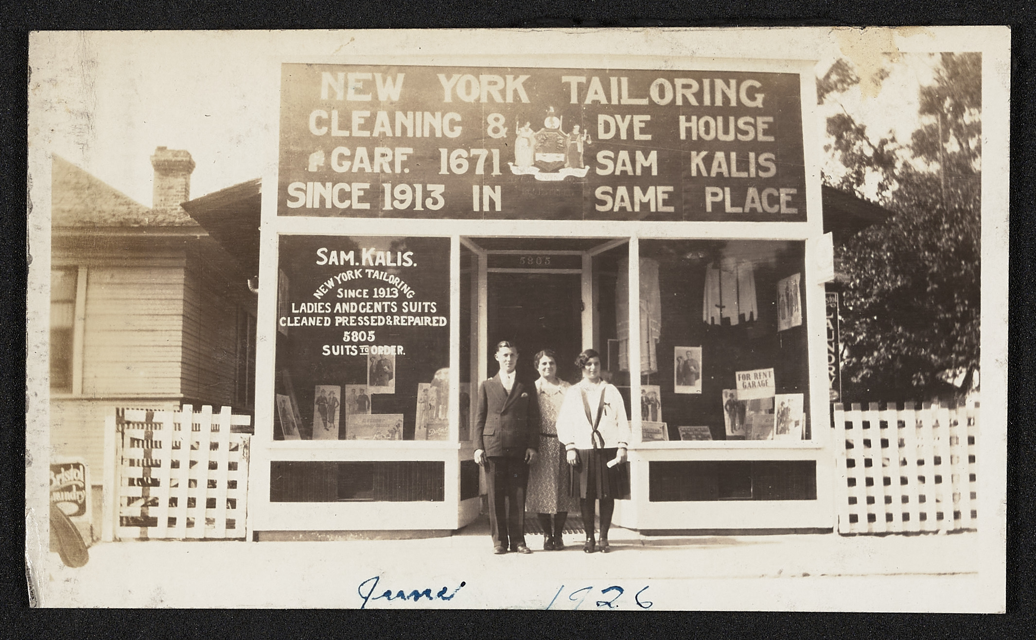 Mrs. Kalis and children in front of tailor shop, Eagle Rock, 1926, 1926 (Internet Archive)