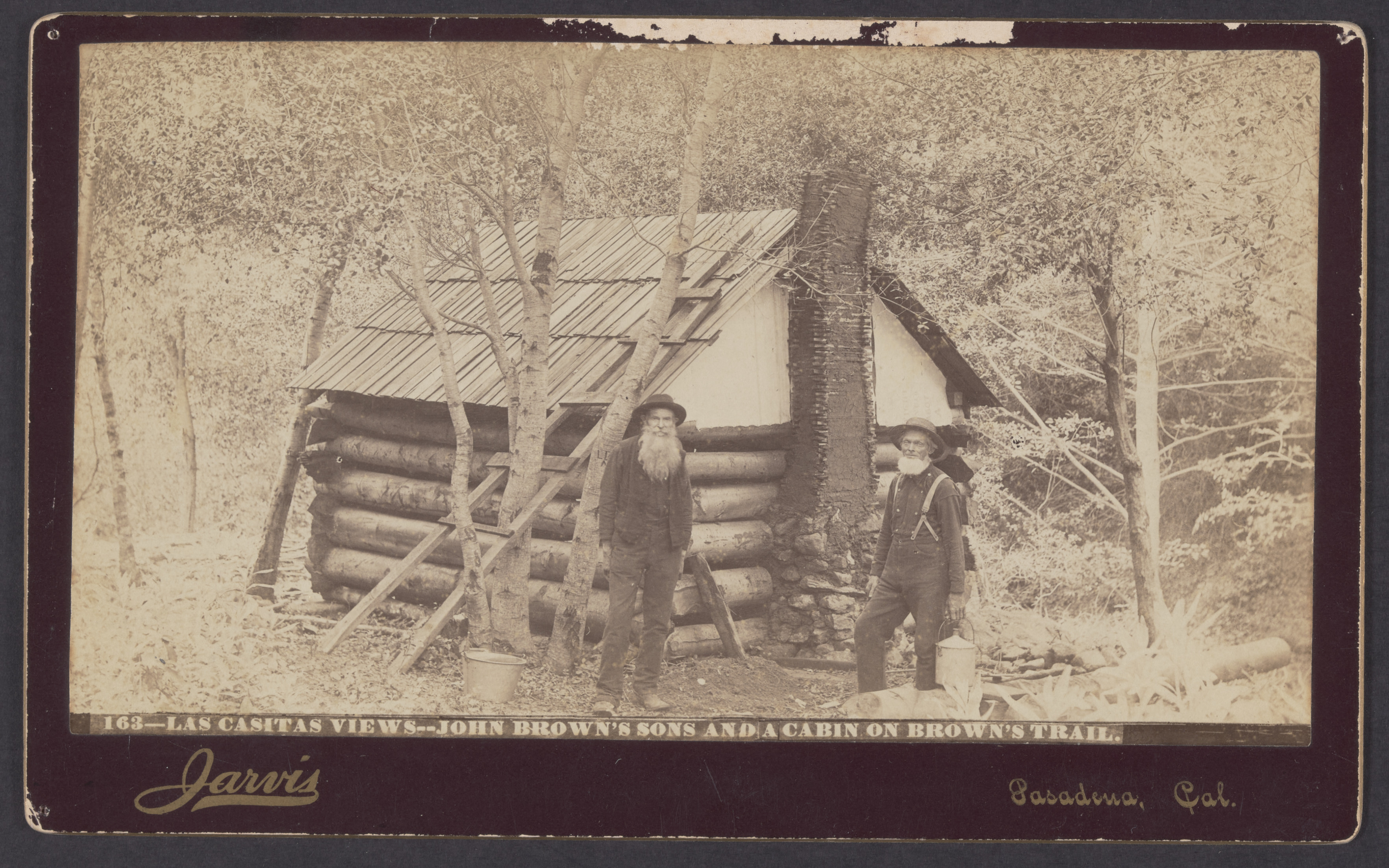John Brown's sons Owen and Jason in front of a cabin on Brown's Trail, 1886 (Internet Archive)