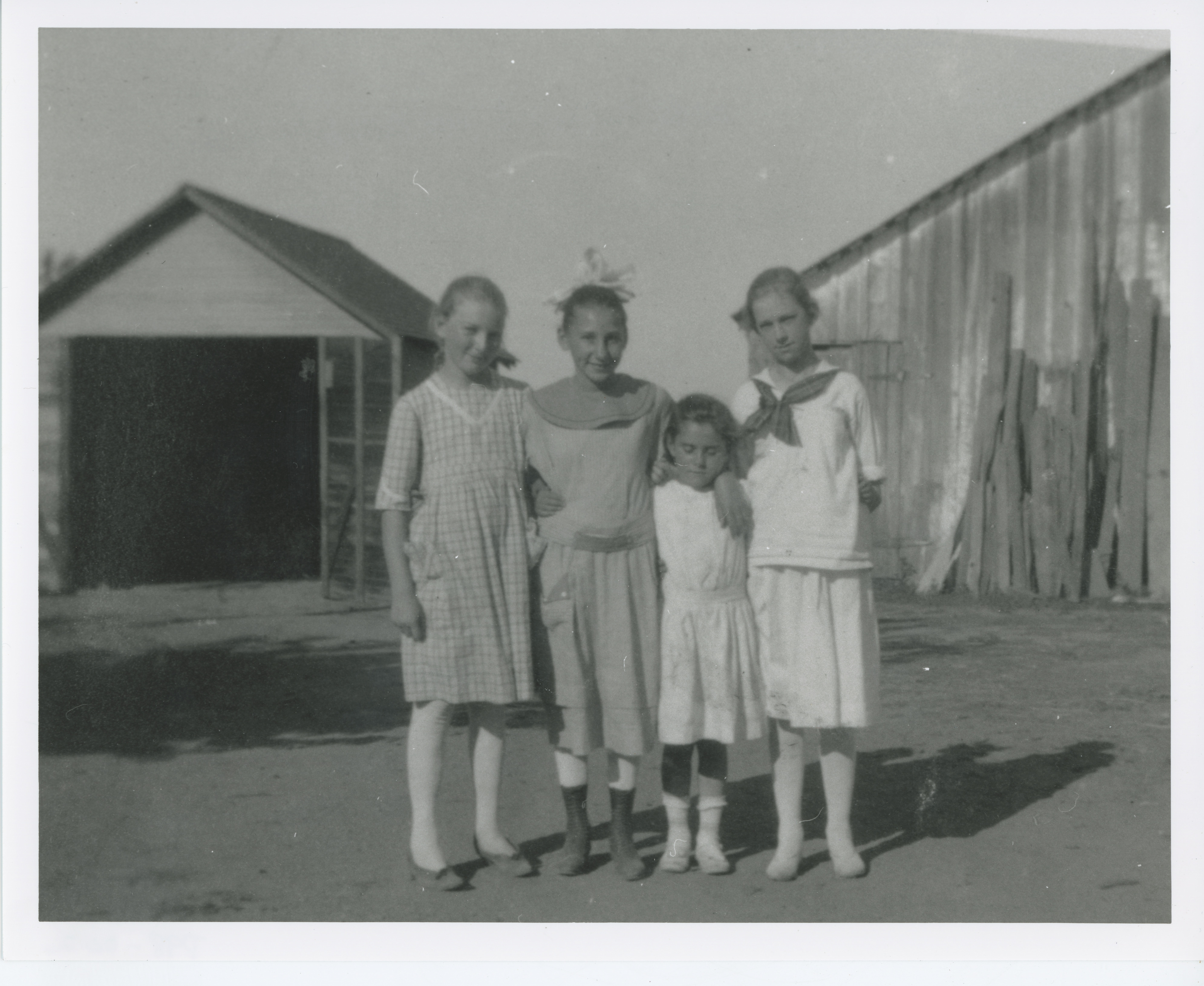 People: Clark and Baccaglio girls standing in front of barn, 1921, 1921 (Internet Archive)
