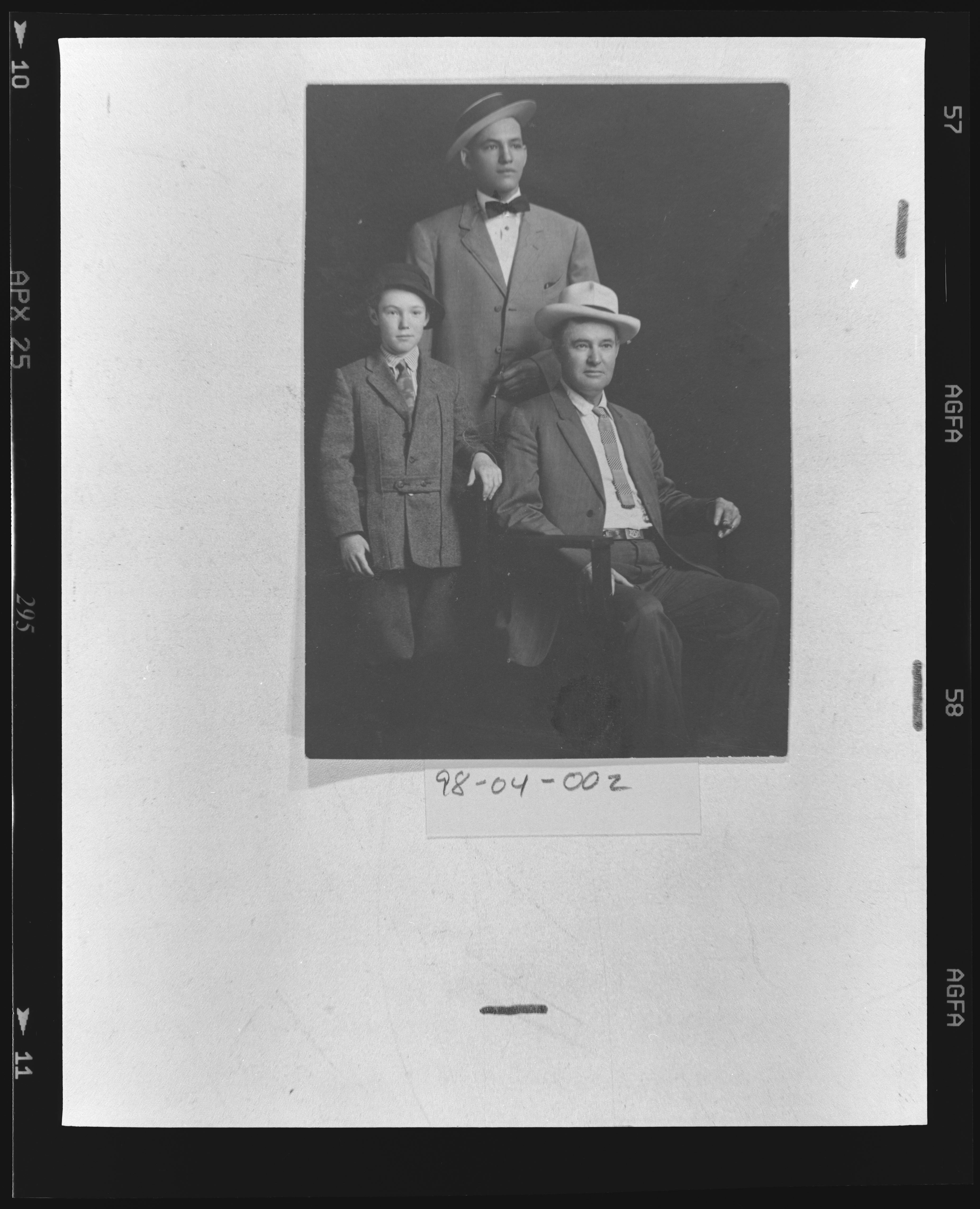 Portrait of Father and sons, 1911 (Internet Archive)