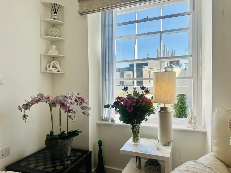 Stunning two-bedroom apartment in the heart of St Helier, complete with a sunny rooftop terrace, secure storage lockup, and dedicated rented parking for your utmost convenience. — photograph 6