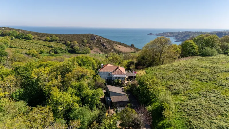 Elevated Coastal Living with Panoramic Valley and Sea Views — main photograph