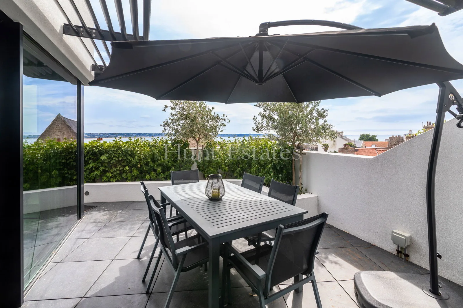 St. Aubin’s Bay Views From This Immaculate Apartment — main photograph
