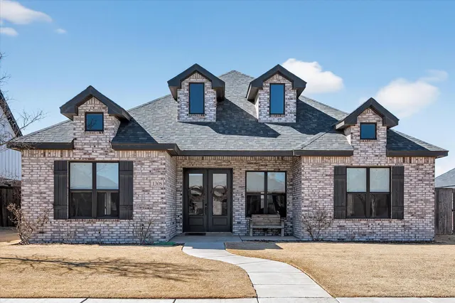 Front exterior — 1308 Dover Lane, Wolfforth, TX 79382