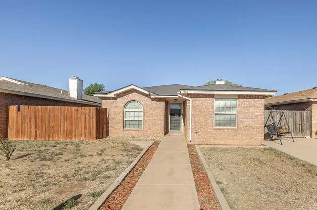 Front exterior — 1036 Iola Avenue, Lubbock, TX 79416