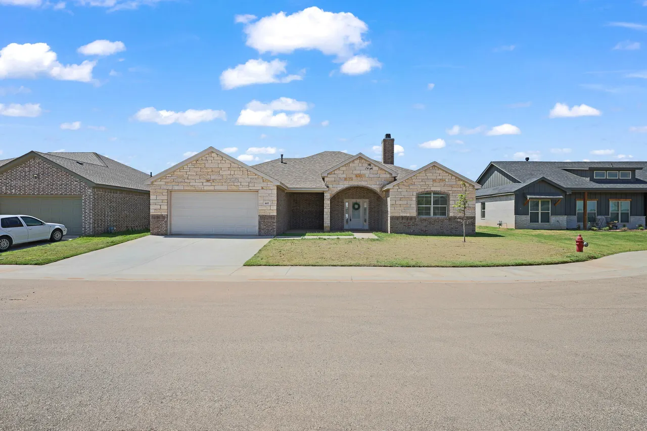 Front exterior — 407 Cowboy Lane, Wolfforth, TX 79382