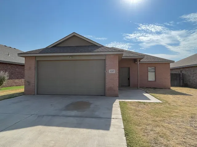 Front exterior — 11207 Akron Avenue, Lubbock, TX 79423