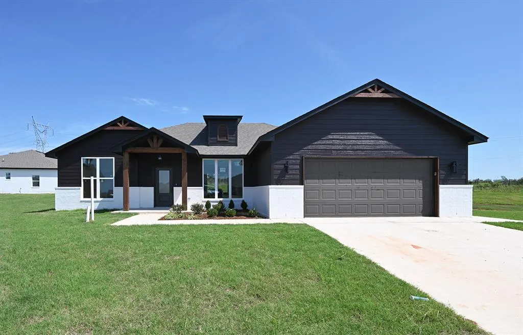 Front exterior — 1233 E Ruger Lane, Mustang, OK 73064