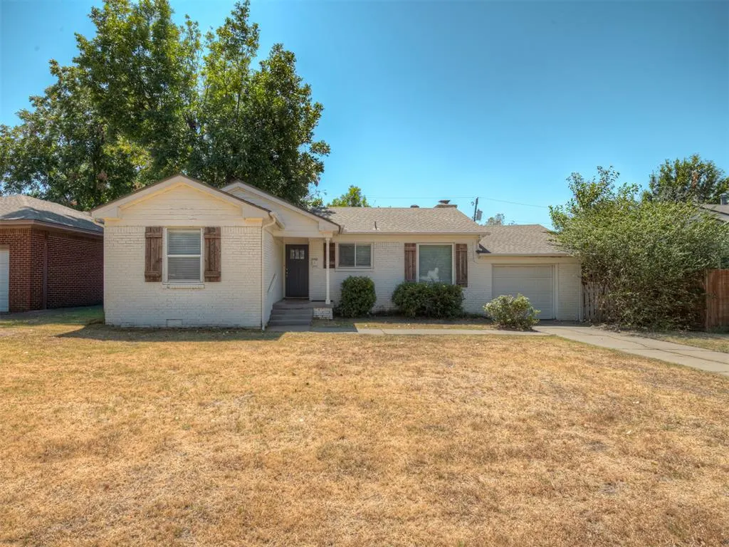 Front exterior — 1414 Oxford Way, The Village, OK 73120