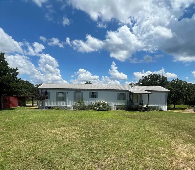 Front exterior — 25248 Drummond Curve, Tecumseh, OK 74873